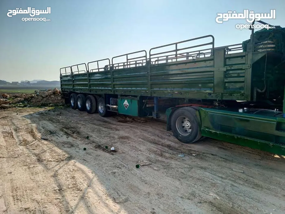 عرباي تريلا اربع محاور اجناب دبلات دنجل بيبي مع سياره فورد للبيع او البدل على سياره حديثه