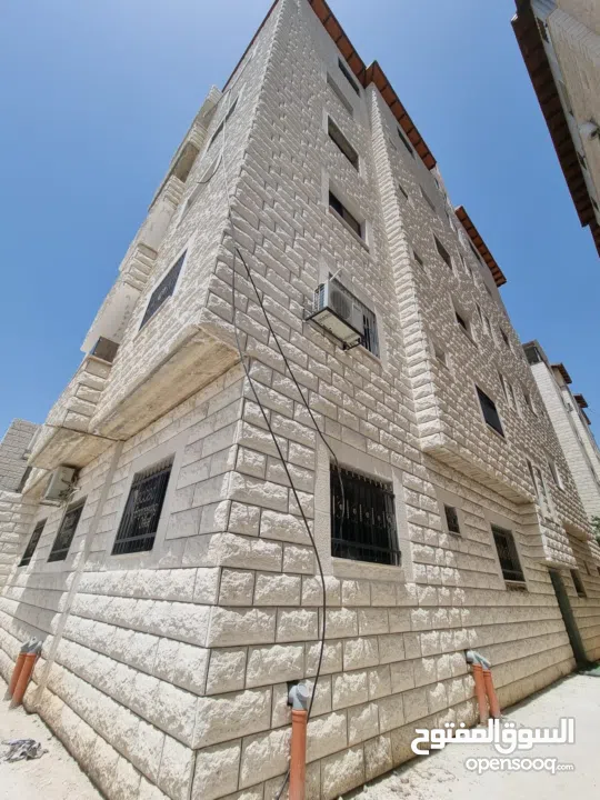 شقة في عمارة الواحة ش نابلس