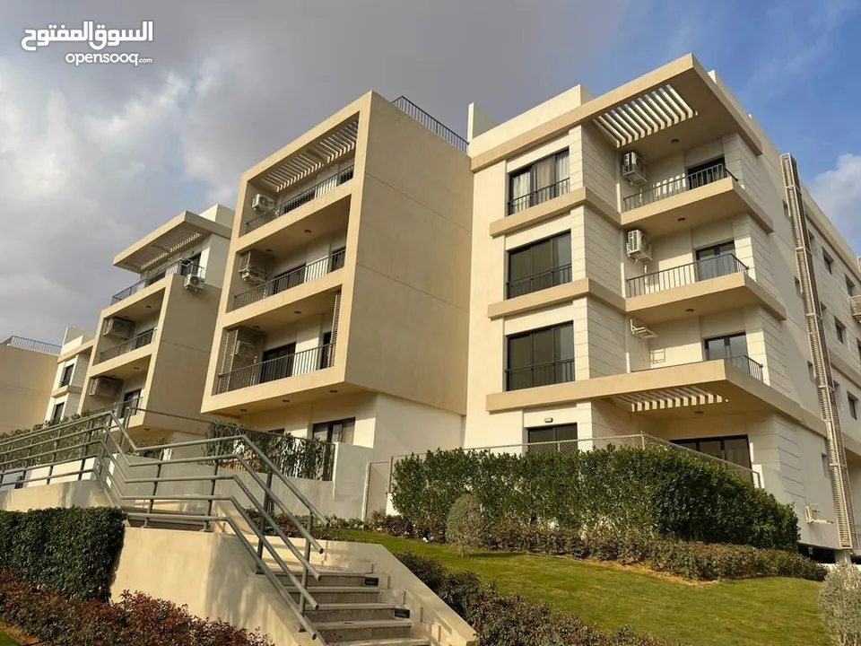 بالتقسيط على 8 سنين شقة بروف 121م مميزة  بكمبوند فيفث سكوير المراسم التجمع fifth square marasem