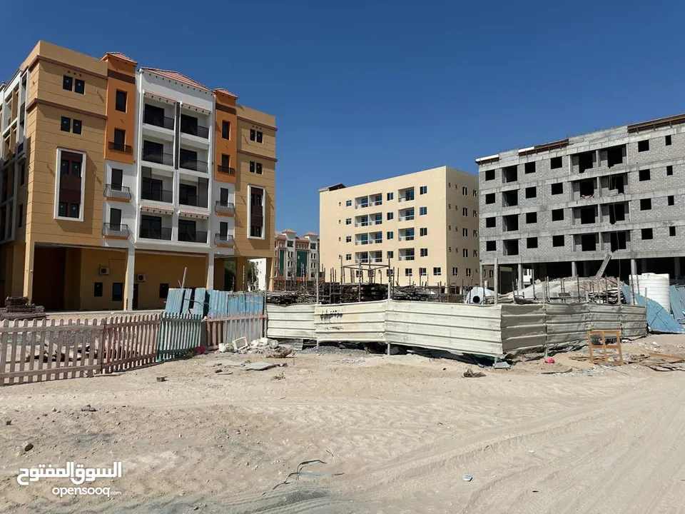 $Land for sale in Al Mowaihat in the best residential and commercial investment location,$$