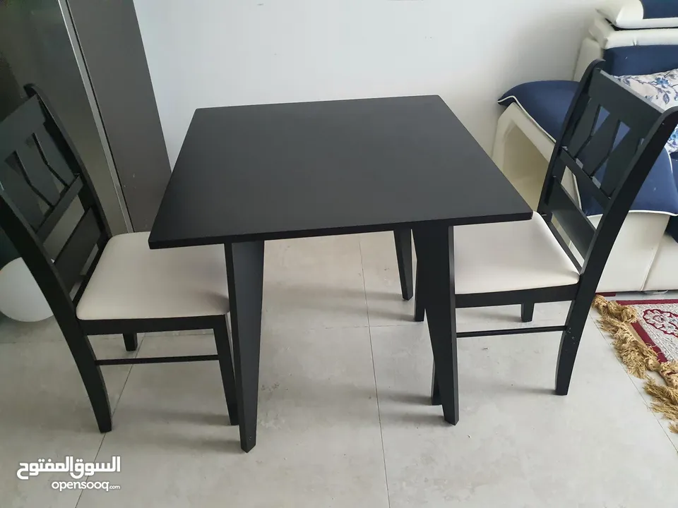 Dinning table with two chairs