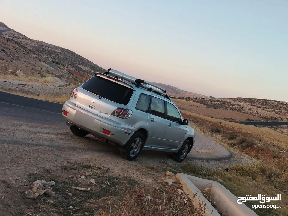 ميتسوبيشي اوت لاندر 2003