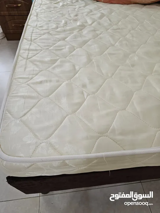Double bed, medicated mattress and side table in perfect condition