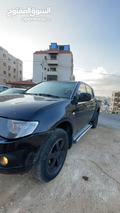 بكم ميتسوبيشي l200موديل 2014