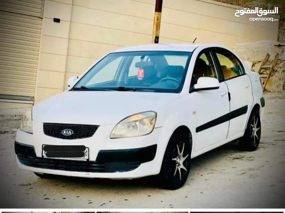 كيا برايد لون ابيض 2008