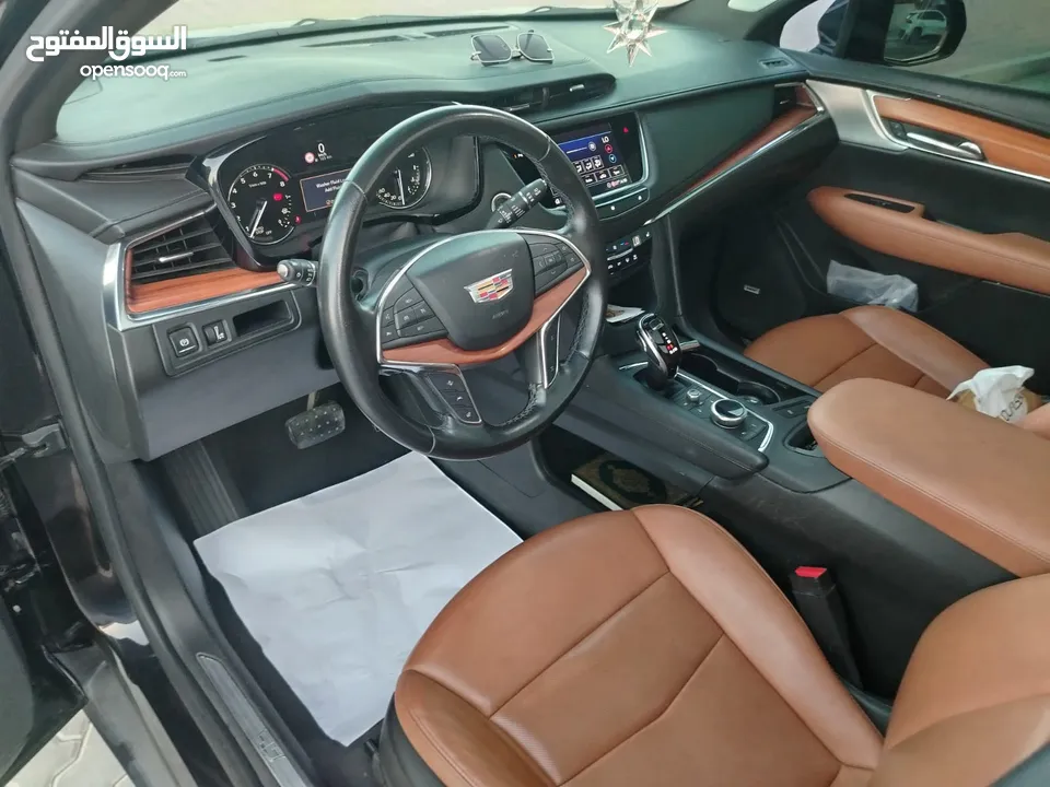 كاديلاك XT5 موديل 20 خليجي تشييكات الوكالة صبغ الوكالة بالكامل ممشى ممتاز فقط 79 ألف كيلو