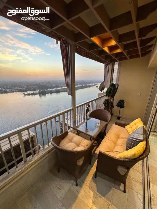 Nile Apartment for sale next to hilton hotel with all furnished and AC's  ready to move in maadi