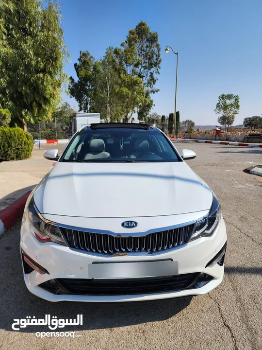 Kia Optima 2018 — لون أبيض لؤلؤي تحفة