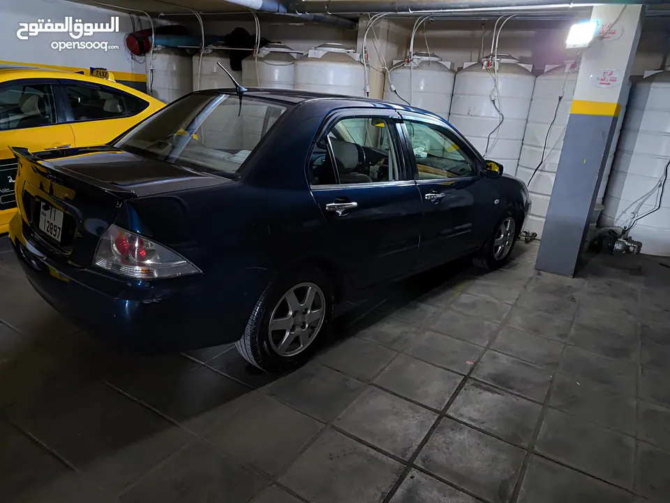 متسوبيشي لانسر GLX 2007 1600 cc وارد الخليج الكويت جميع الإضافات بإستثناء الفتحه وجنط إضافي.
