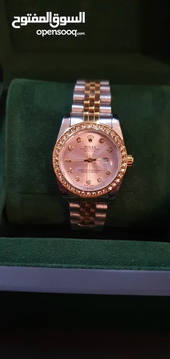 ساعة Rolex Copy كوبي نسائية ألماس+معدن ذهبي و أبيض مع علبة و كيس Rolex و قابل للتفاوض