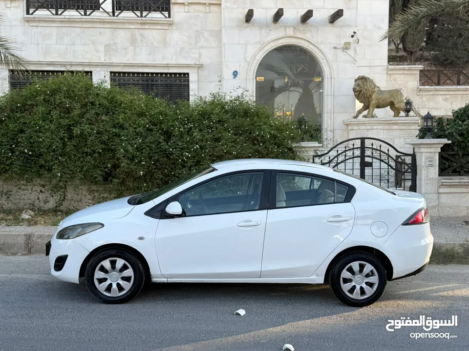 مازدا زوم 2 موديل 2012 فحص كامل 7 جيد ولا ملاحظة لون ابيض قاطعة مسافة 100 الف كيلو فقط (استخدام شخصي