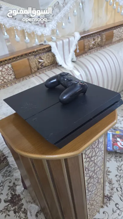 Ps4 Fat  معها يد الأصيلة وألعاب..