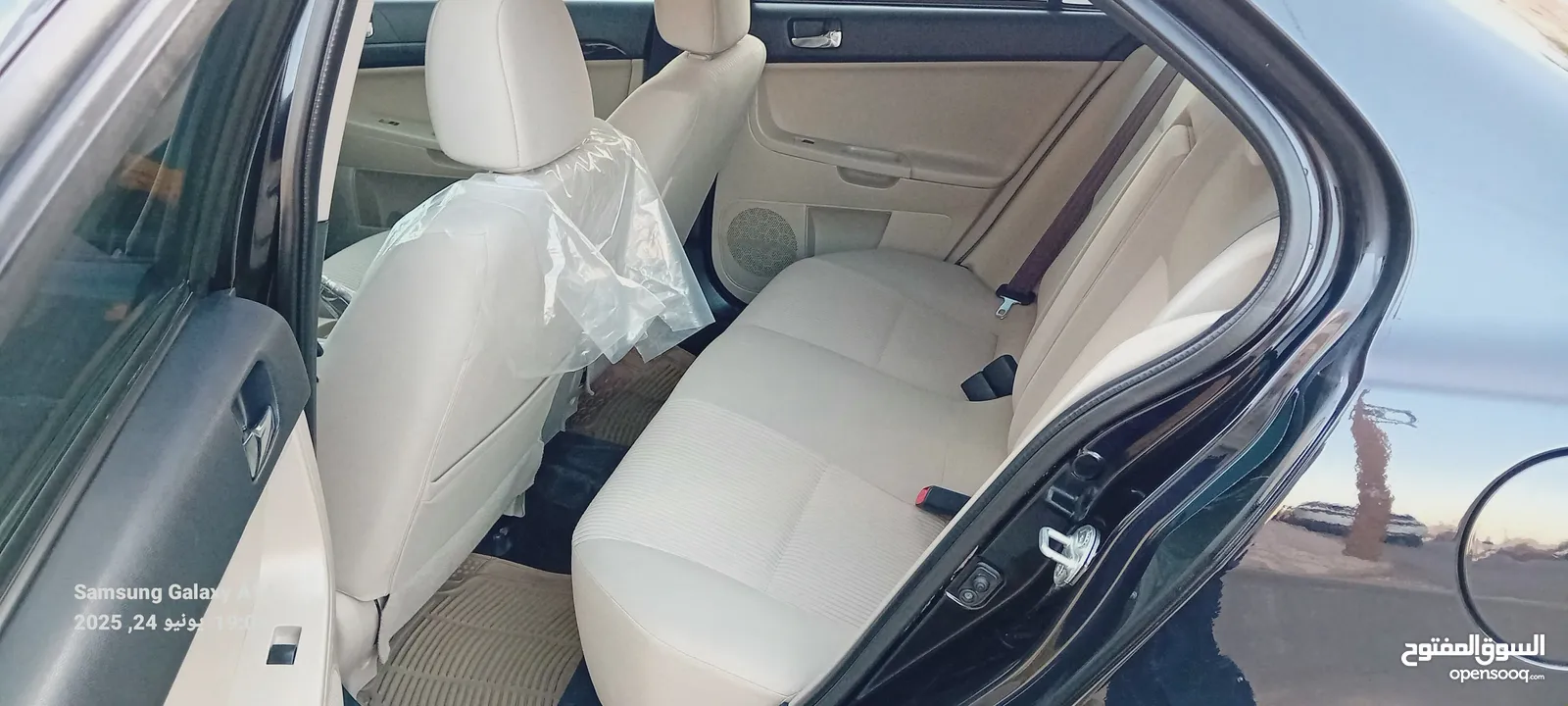 متسوبيشي لانسر فراشة موديل 2015 فحص مرفق مع الصور بحالة الوكاااااالة  ماشية 49 الف km  أصلي