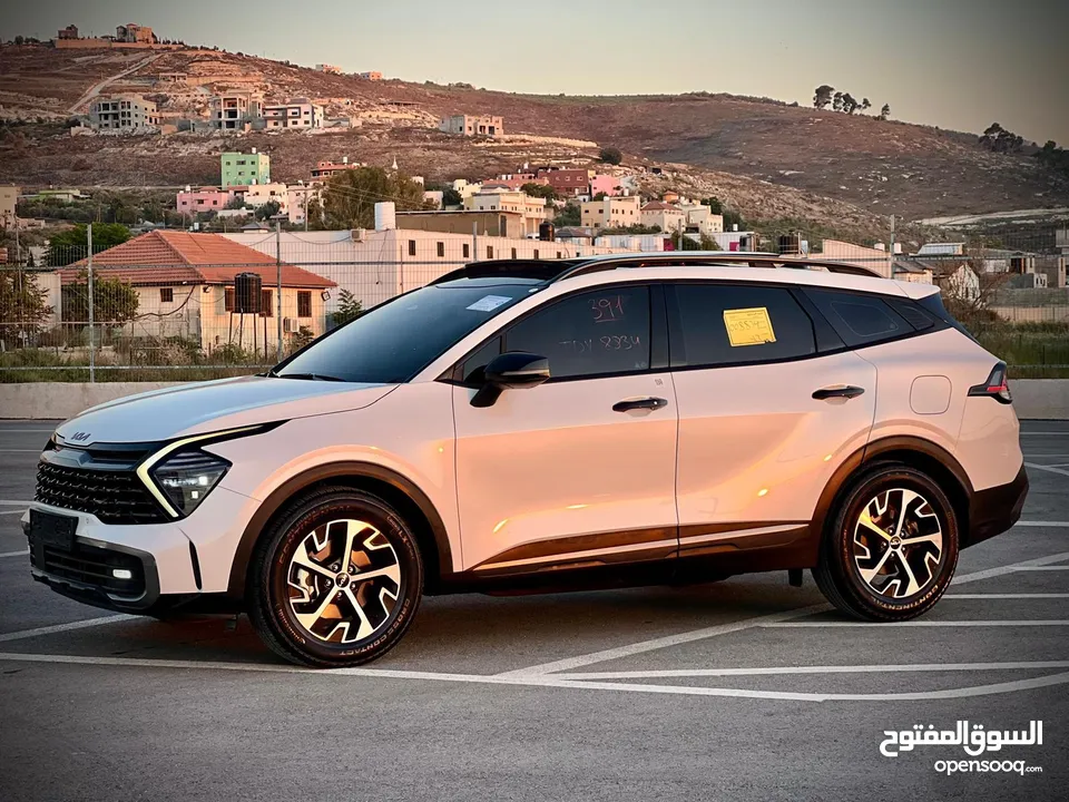 كايا سبورتاج /2022 فل الفل فتحة سقف  2x4 ///240Hp بنزين + كهرباء  ( Haybrid) 1600cc