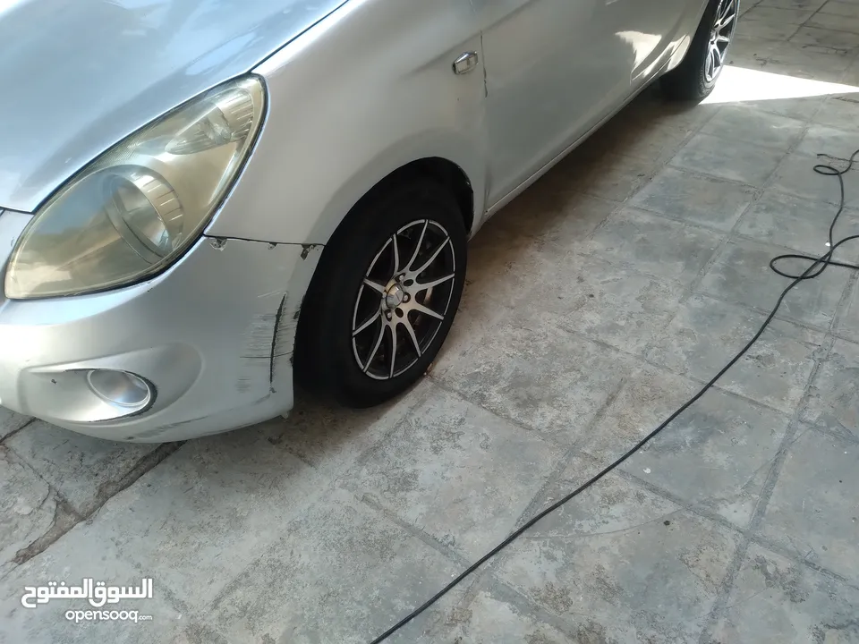جنط نضيف مع كوشوك نضيف للبيع 4 براغي محير قريب و بعيد 170