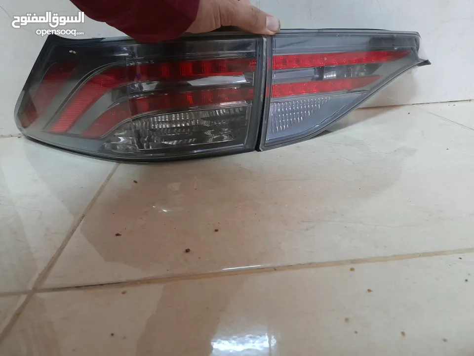 اضوية لكزس ct200 h  بحال الجديد وشانجان وتوسان