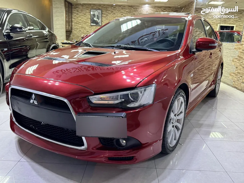 ميتسوبيشي لانسر موديل 2015 GT اصلي فحص كامل بحالة الوكاله فل كامل اعلى صنف من فئتها