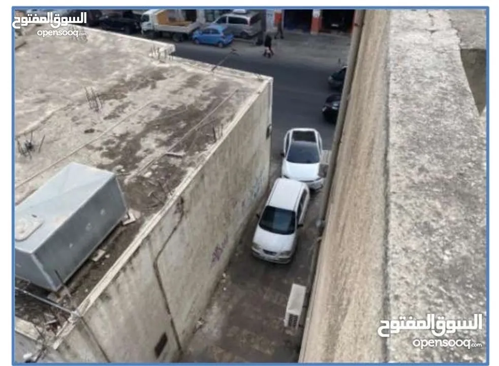 مجمع تجاري في منطقة العبدلي بالقرب من البنك المركزي