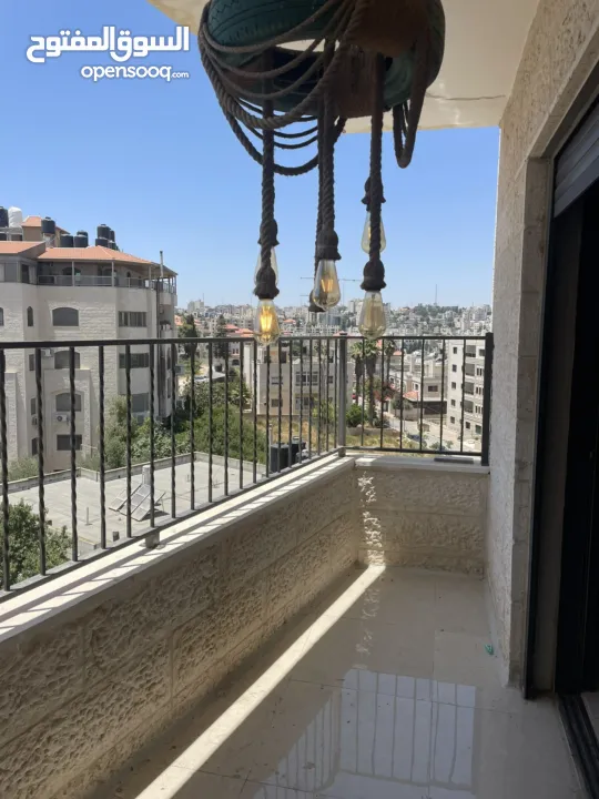 شقة مميزة مفروشة مع تيراسات من جميع الجهات سطح مرحبا  إيجار مفروش او بيع