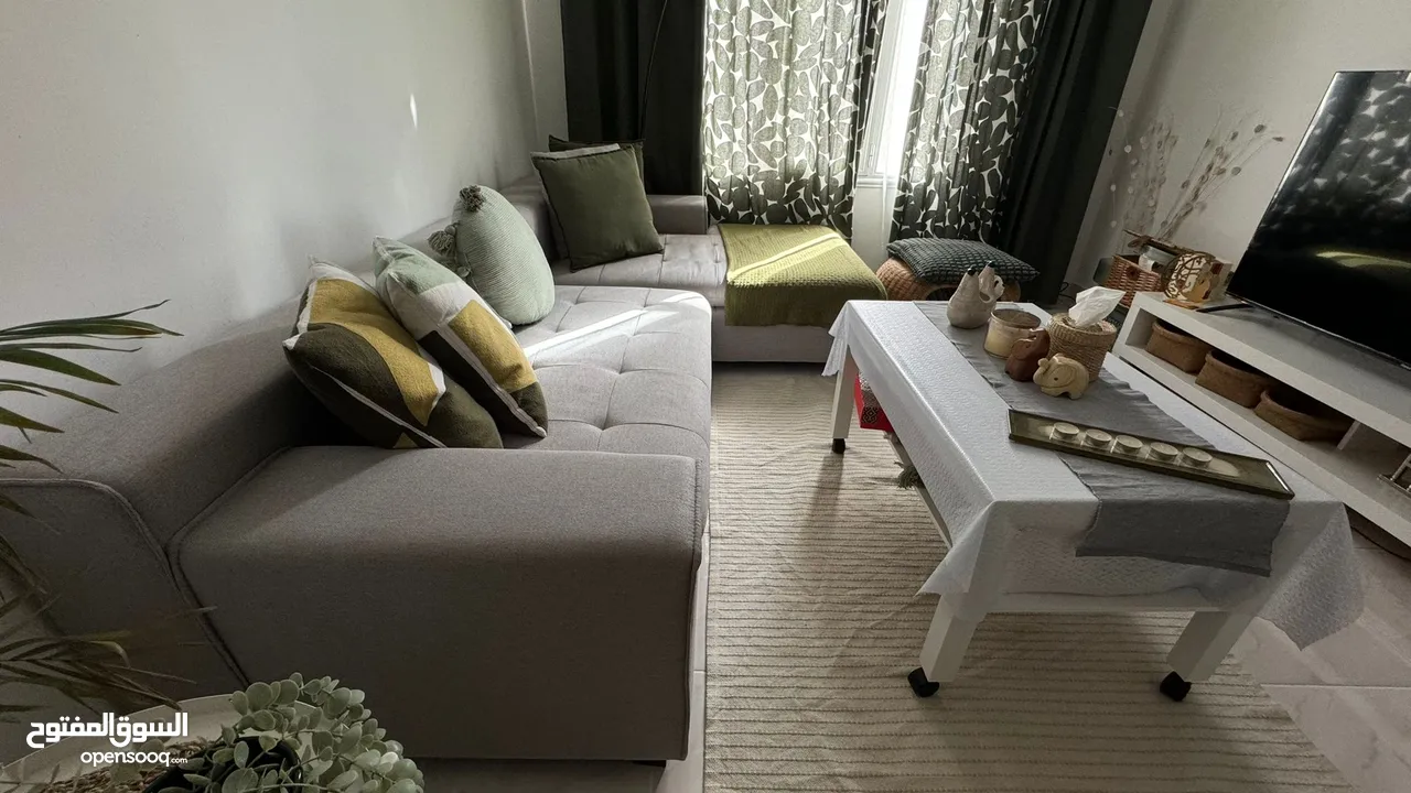 Light grey corner sofa. Used for 1 year only.  صوفا كورنر رمادي استخدام سنة فقط