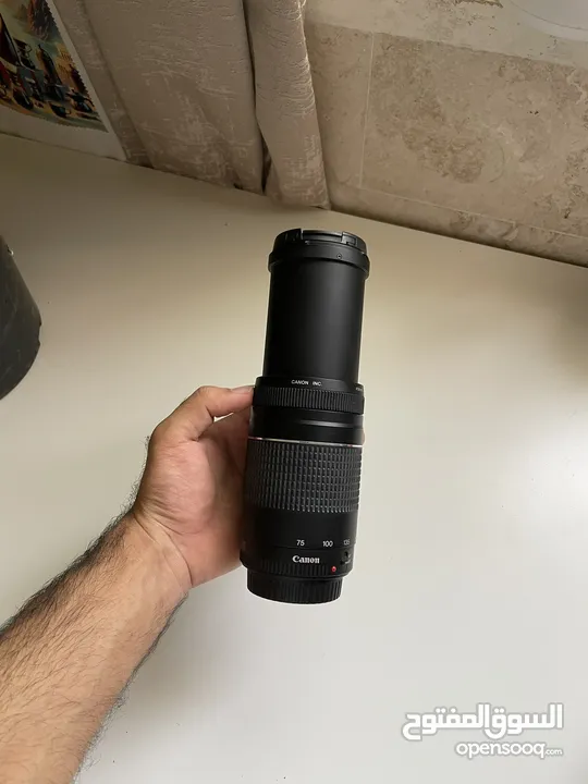 Canon lens zoom 75-300/ 4-5.6f Like a new  عدسة كانون زوم نادر استخدمها.