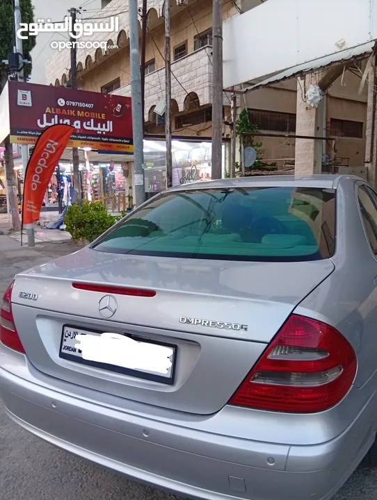 مرسيدس للبدل على احدث e200 كرت ابيض 2004
