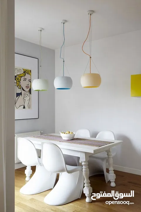 4 White Authentic Verner Panton (by Vitra) Chairs.