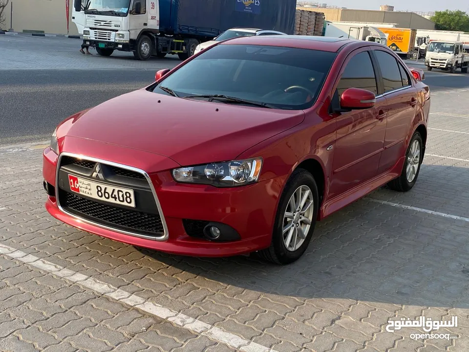 Mitsubishi Lancer... Model 2015...gcc specifications... Super clean