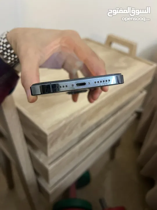 iPhone 12 promax مغير فيه شاشة اصليه وبطارية اصلية 256G ازرق جهاز نظيف