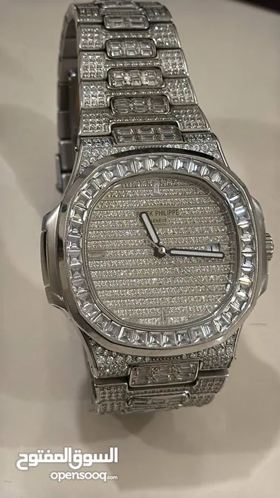 patek philippe nautilus  iced automatic