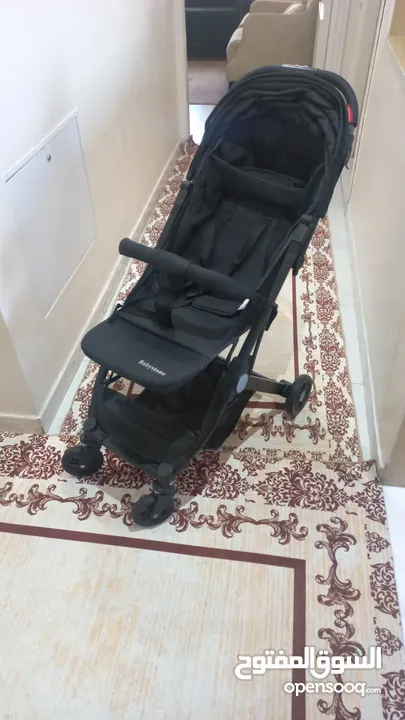 عرباية أطفال شبه جديدة للبيع