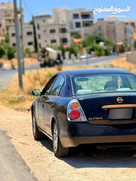 نيسان التما بنزين ماتور 2500 لون اسود