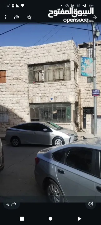 ارض تجاري عليها بناء طابقين