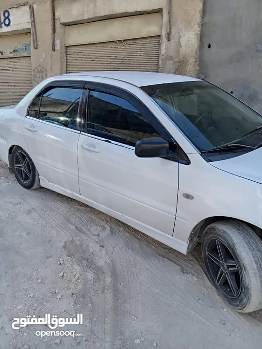 ميتسوبيشي لانسر 2003