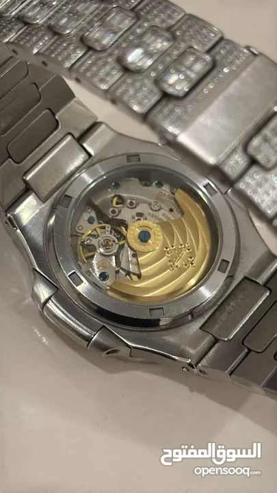 patek philippe nautilus  iced automatic
