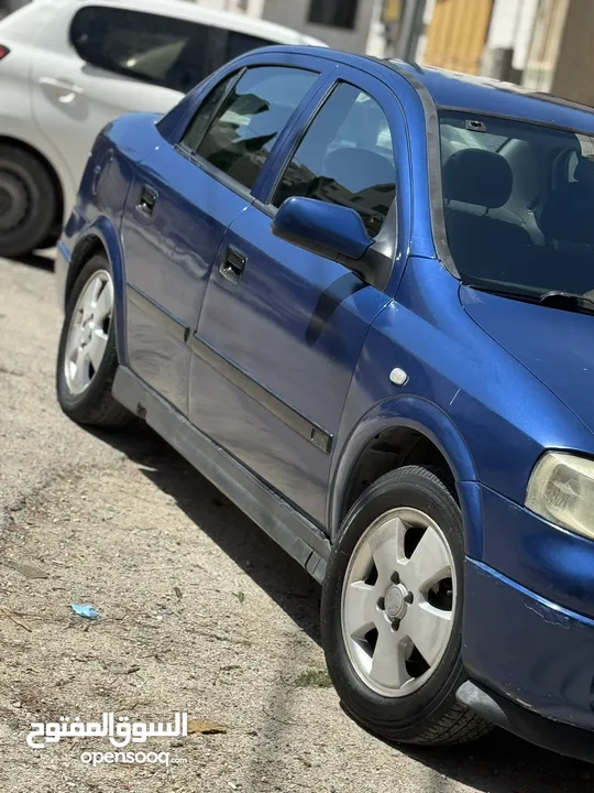 أوبل للبيع بسعر ناررر والي معني منزبطو بزياده حبه السياره كرتونه زي مهي بصوره ولا ضربه السياره