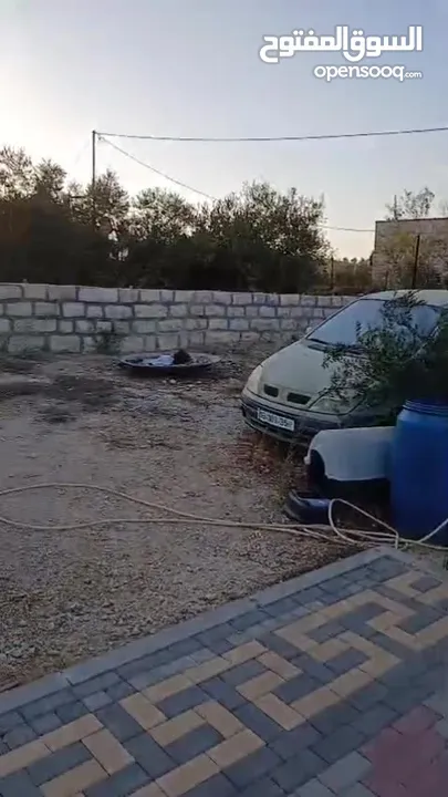 ارض دونم مع عمارة اربع طوابق للبيع