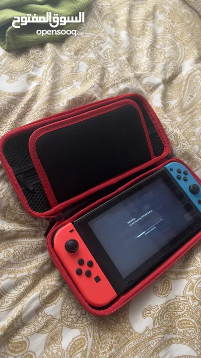 جهاز Nintendo switch استعمال بنت بحالة ممتازة مع pro controller واكسسوارات