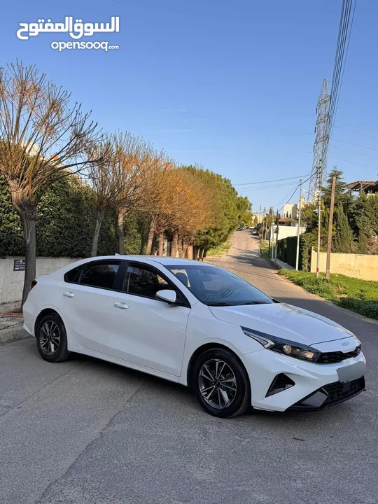 دفعه تبدآ 2250 قابل للبدل كيا3 2022 بنزين وارد كوري جمرك جديد فحص كامل فل فقط بدون فتحه وأقل سعر