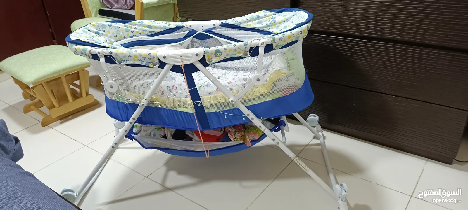 Baby cot, bouncer and feeding pillow