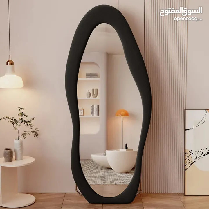 مرايا ترند عالمياً... تصميم موجي ومنحوت فخم يخلي أي زاوية تصير قطعة فن جاهزة للتصوير