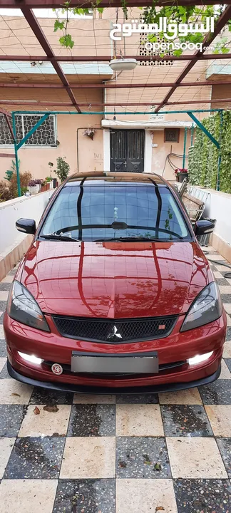 ميتسوبيشي لانسر glx  2010 1600 اصلي
