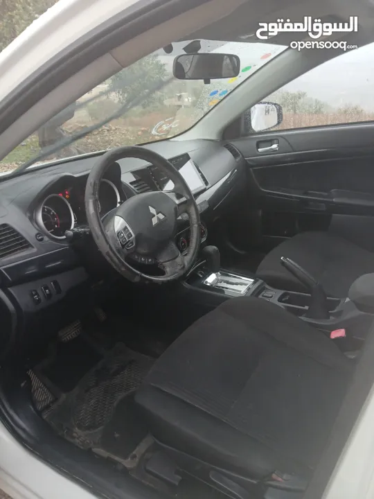 ميتسوبيشي لانسر. 2015 اصل برايفت رخصة وتامين ماطور 1600 اتومات شامل فتحة