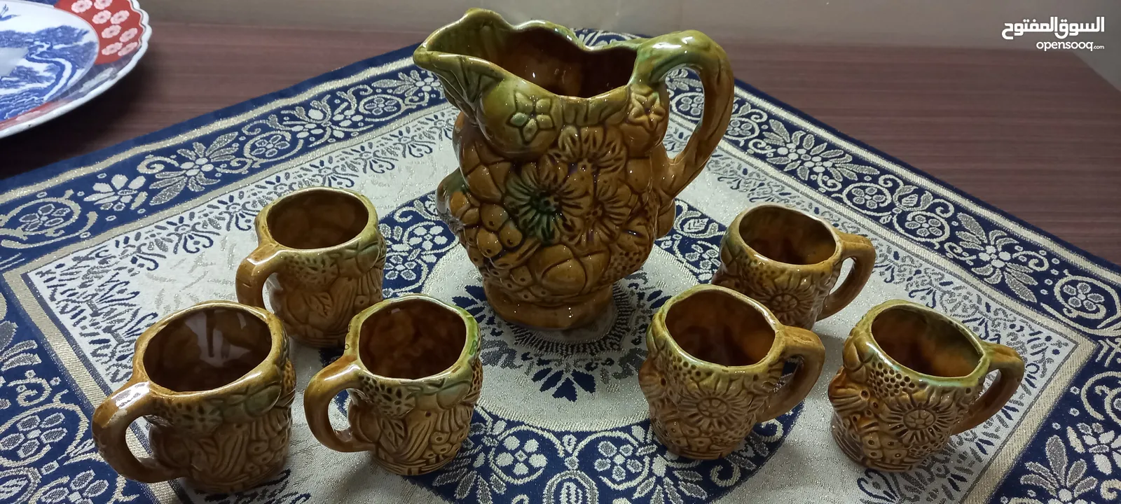 طقم ابريق و 6 كاسات فخار انتيك