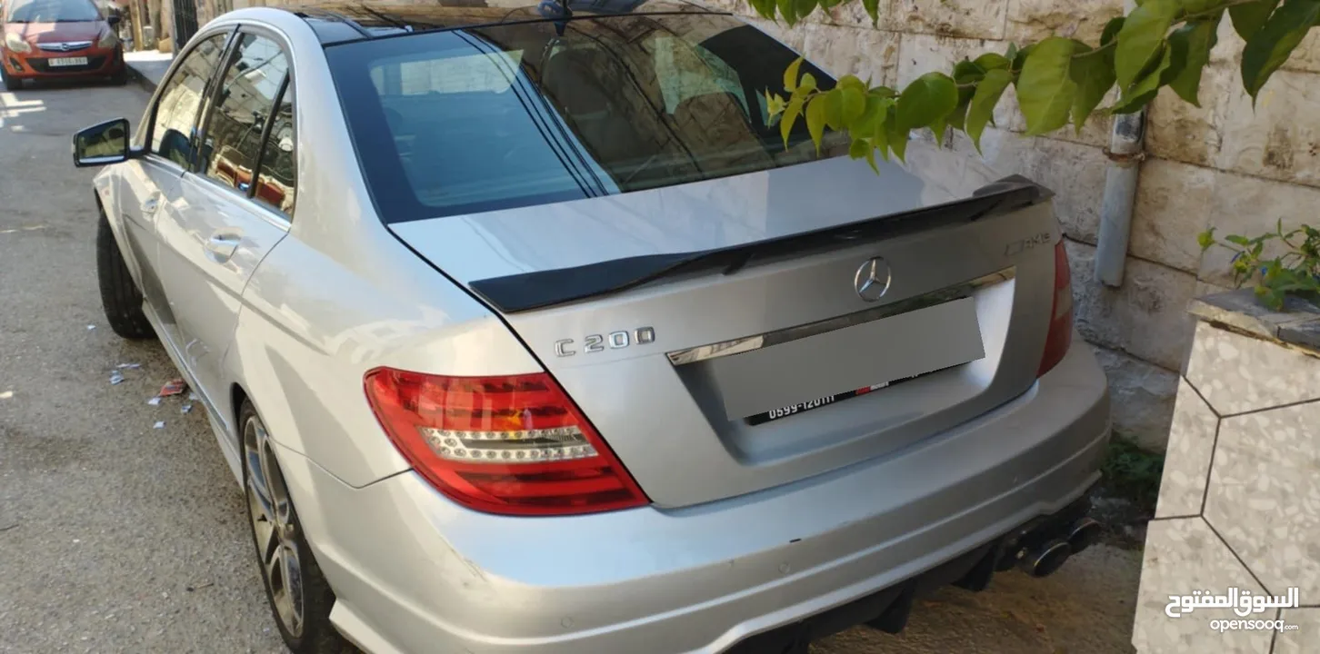 مرسيدس 2012 C200 AMG للبيع على الكاش اتومات وتوب ترينك وغيار اسبورت 7غيار فل اضافات بانورما مع فتحه