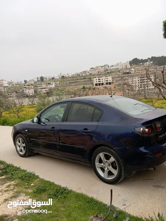 مازدا شلوش مشطوب متور قير جداد  شاشه  جنط مغنيسيوم  حبتها عليها  هيئه