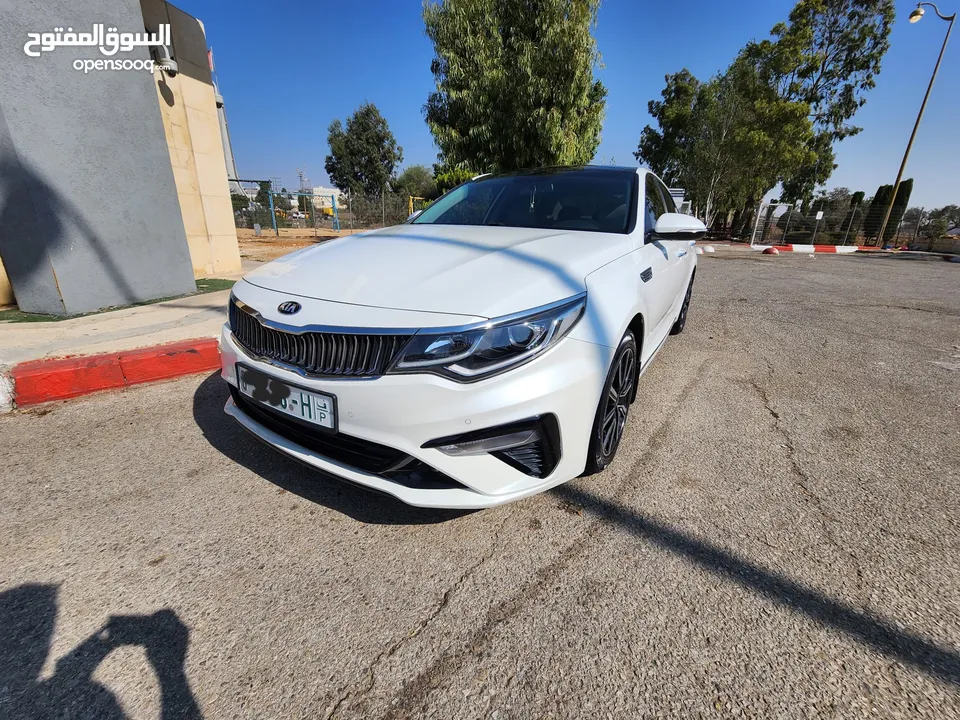 Kia Optima 2018 — لون أبيض لؤلؤي تحفة
