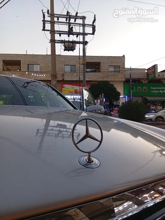 مرسيدس للبدل على احدث e200 كرت ابيض 2004