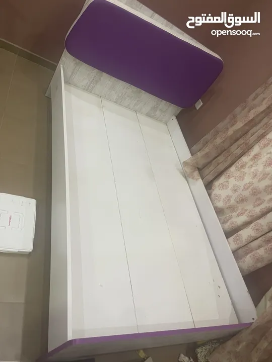 Bed room and cupboard and baby bed