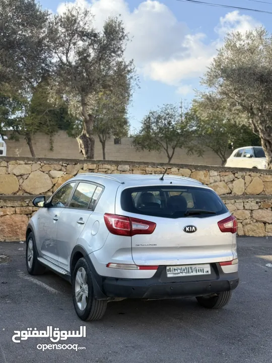 سبورتاج ديزل ماتور 2000 اتومات 4*4 اصل برايفت فحص ممتاز